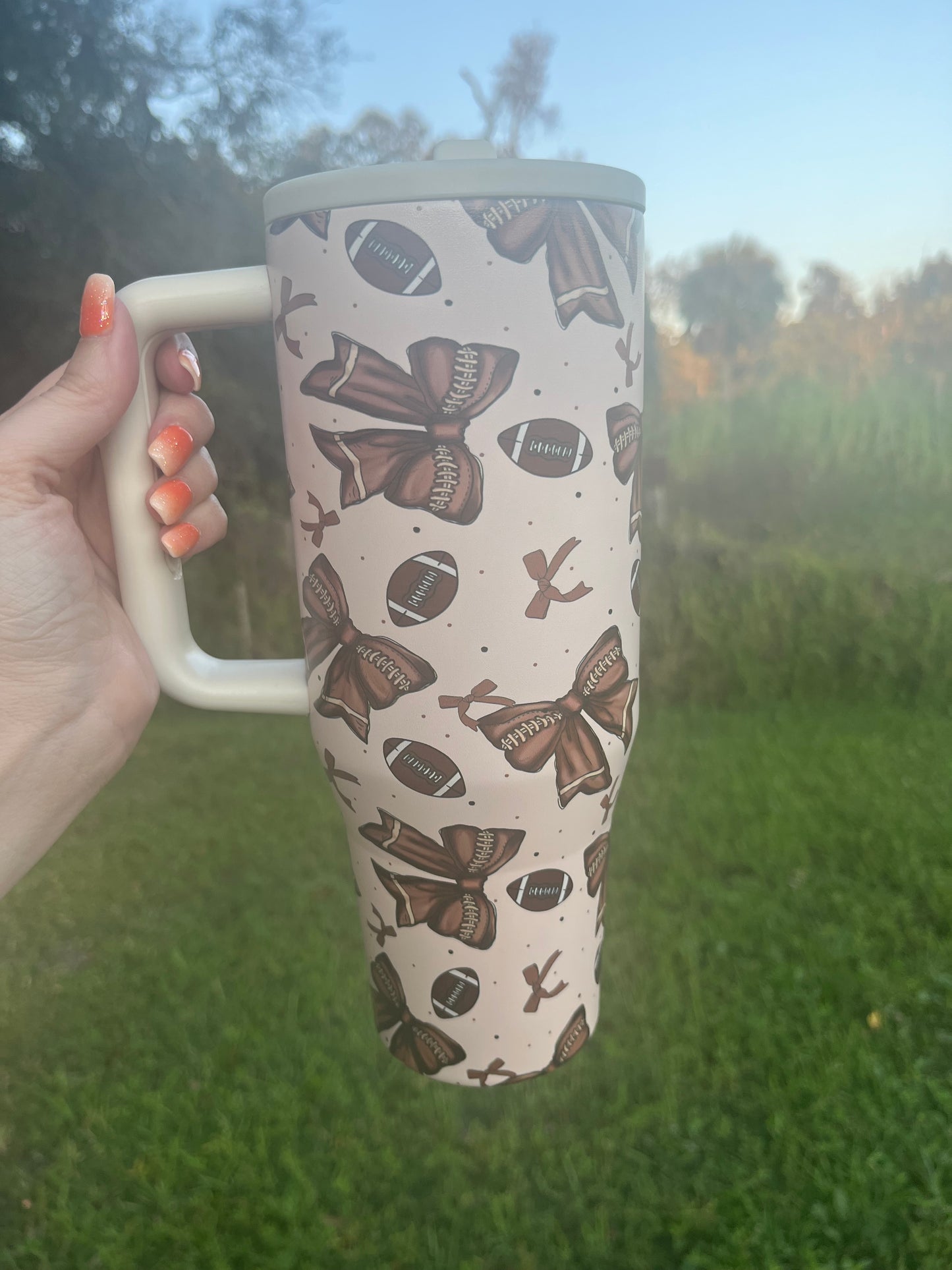 40oz Football 🏈 & Bows Tumbler