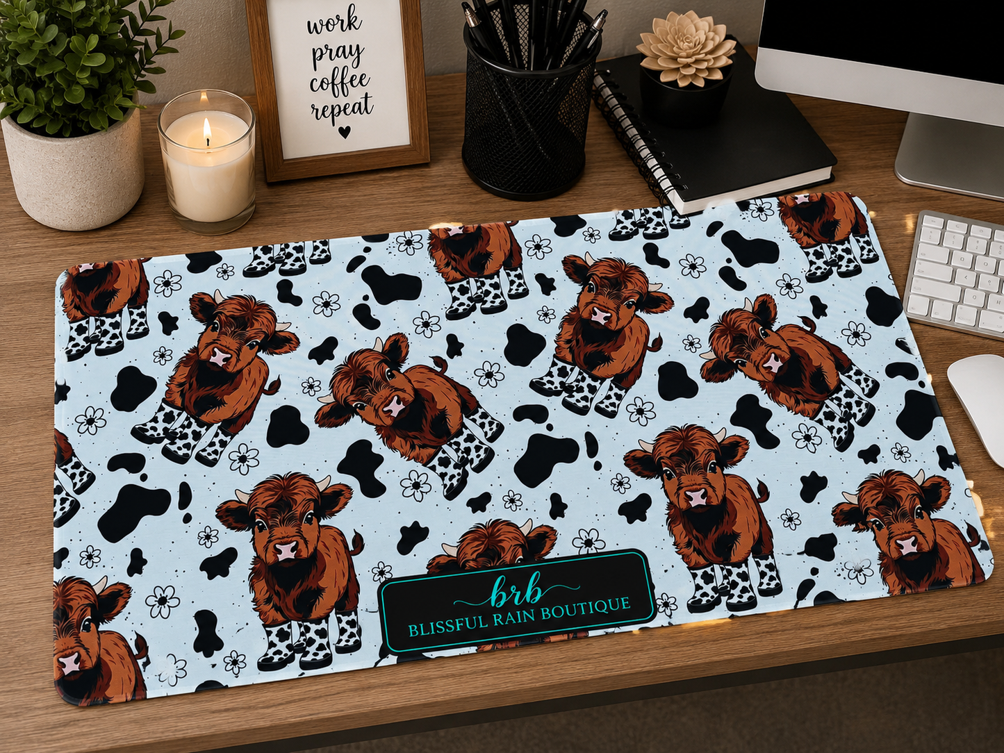Highland in rain boots desk mat