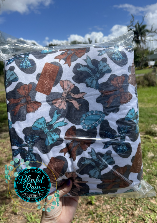 Cow Print Wrangler Bows Blanket